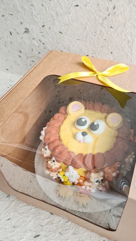 Lastetordid erikujuline lastetort vahukommidega lõvi