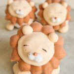 Laste magustoidud karakteriga vahupallid lõvid